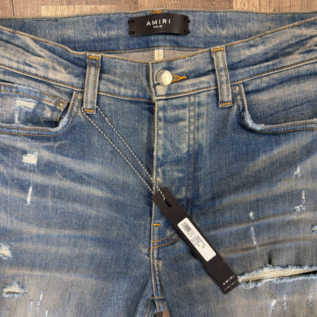 Amiri Jeans Blue Ripped Patch