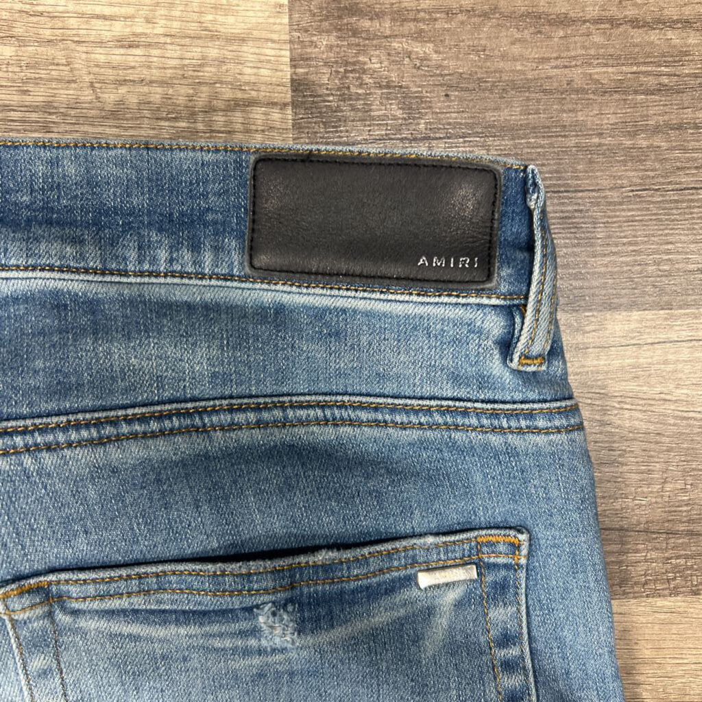 Amiri jean blue multicolor thrasher patch