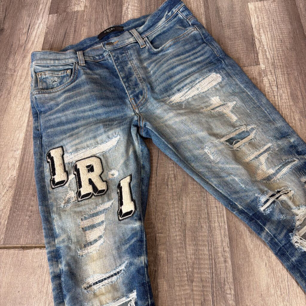 Amiri Jean Varsity Oblique Logo