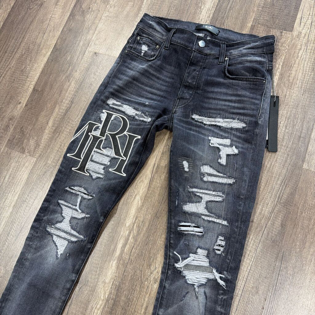 Amiri Jean Distressed oblique logo grey