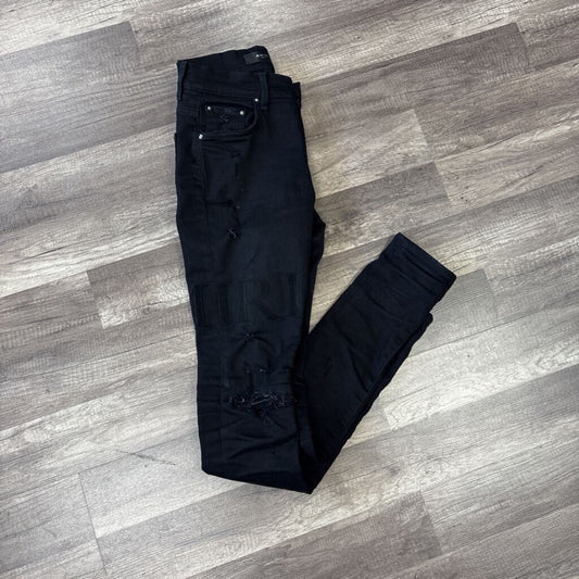 Amiri Jeans black oblique Logo patch