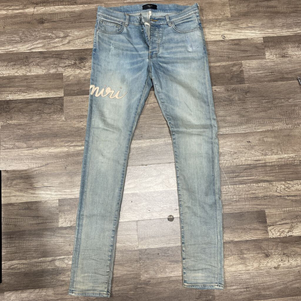 Amiri jeans blue white logo