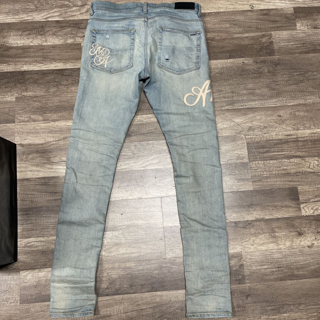 Amiri jeans blue white logo
