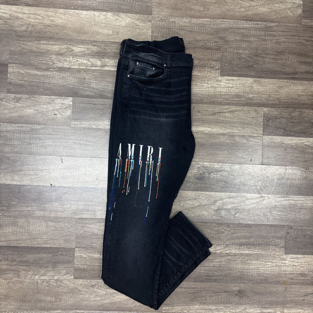 Amiri Jean Black Drip Logo