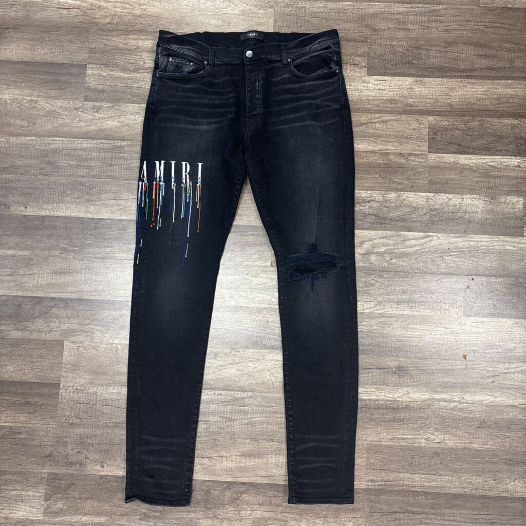 Amiri Jean Black Drip Logo