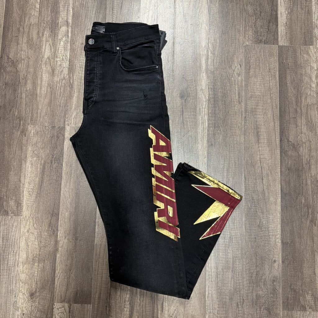 Amiri Jean Red Gold Logo