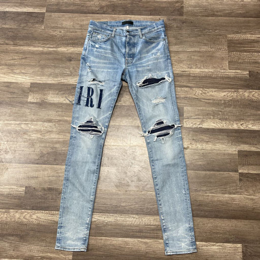 Amiri Jean Light Blue Navy Oblique Logo