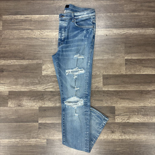 Amiri Jean Mx1 Light Wash Rip Knee