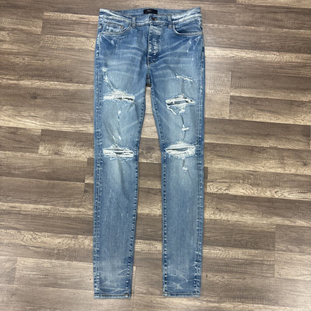 Amiri Jean Mx1 Light Wash Rip Knee
