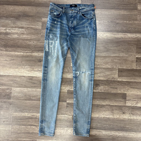 Amiri Jean Light Wash Oblique Logo