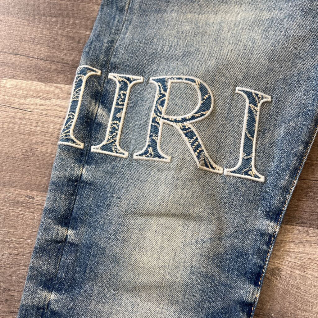 amiri jeans blue oblique logo patch