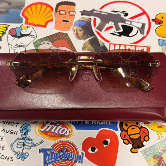 Gucci rectangle rimless sunglasses brown