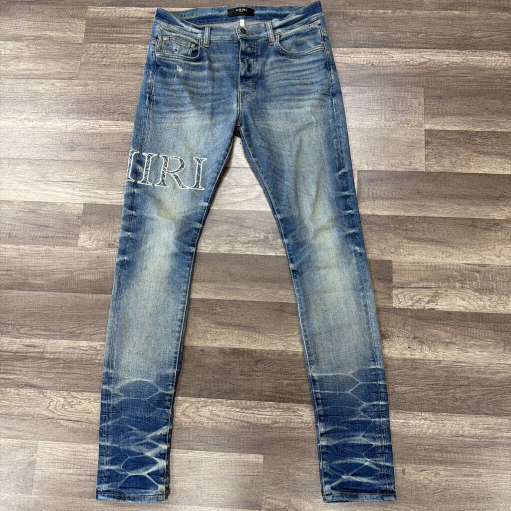 Amiri Jean Blue Paisley Logo