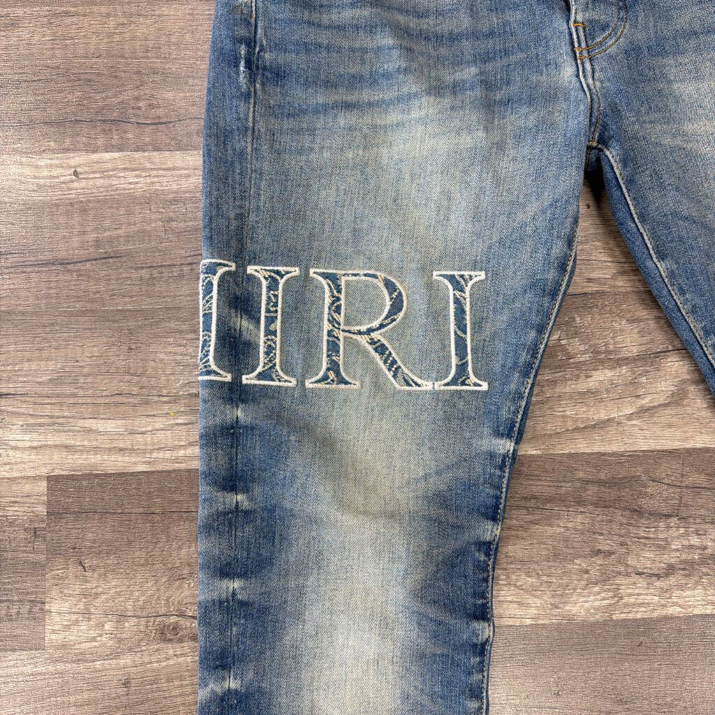 Amiri Jean Blue Paisley Logo