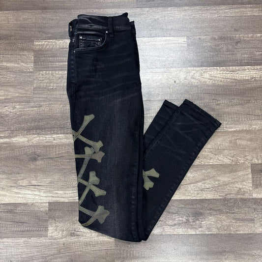 Amiri Jean black crossbone logo