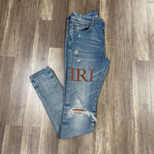 Amiri Jean Brown Leather oblique Logo