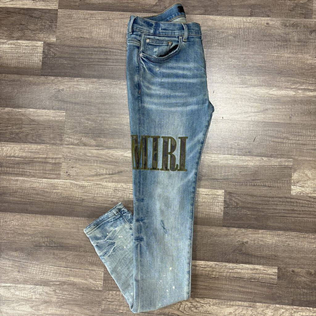 Amiri Jean Camo Oblique Logo