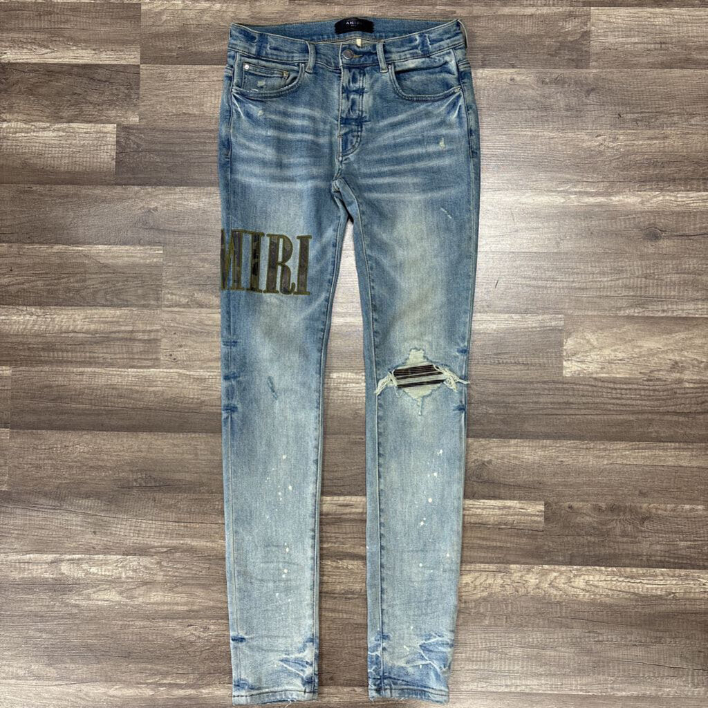 Amiri Jean Camo Oblique Logo