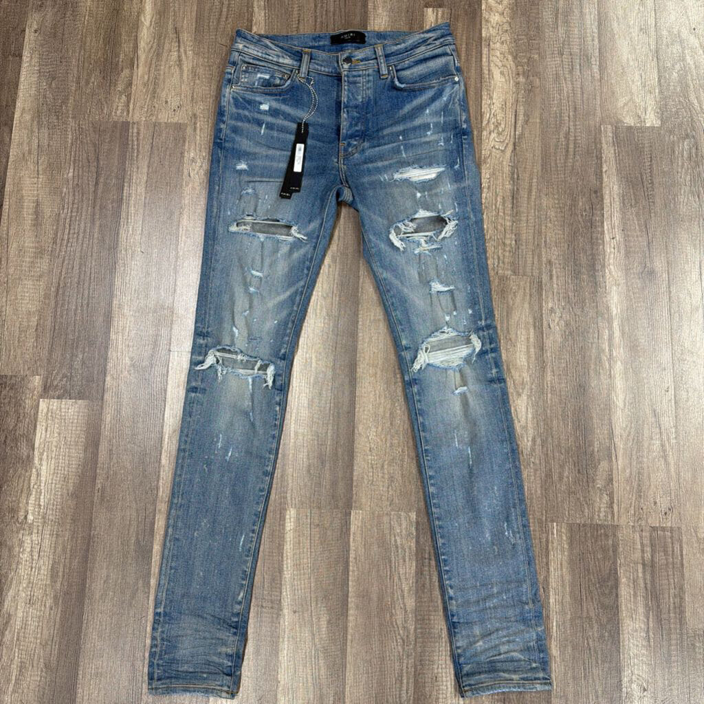 Amiri Jeans Blue Ripped Patch