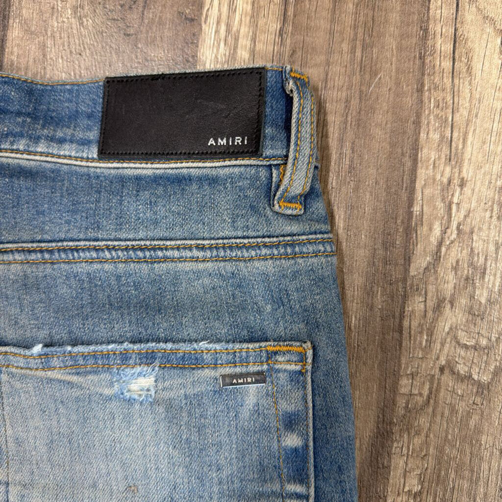 Amiri Jeans Blue Ripped Patch