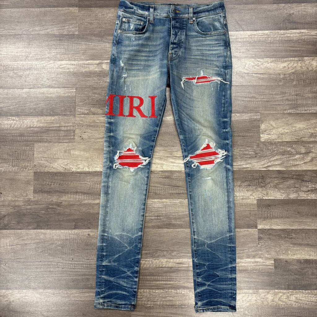 Amiri Jean Red Oblique Logo