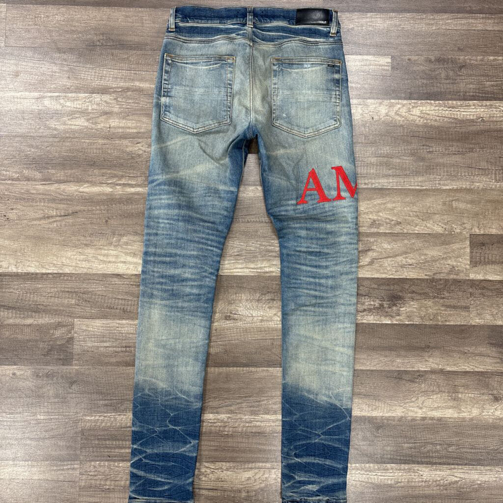 Amiri Jean Red Oblique Logo