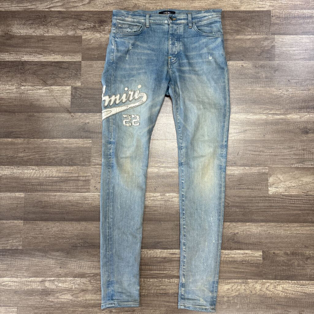 Amiri Jean MX1 White Varsity Logo