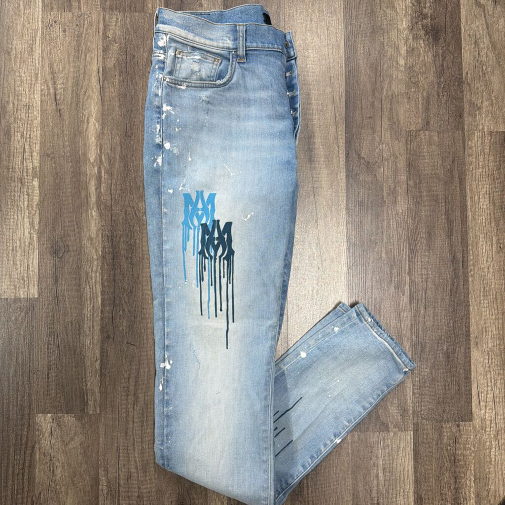 Amiri jean MA Logo Blue Paint splatter