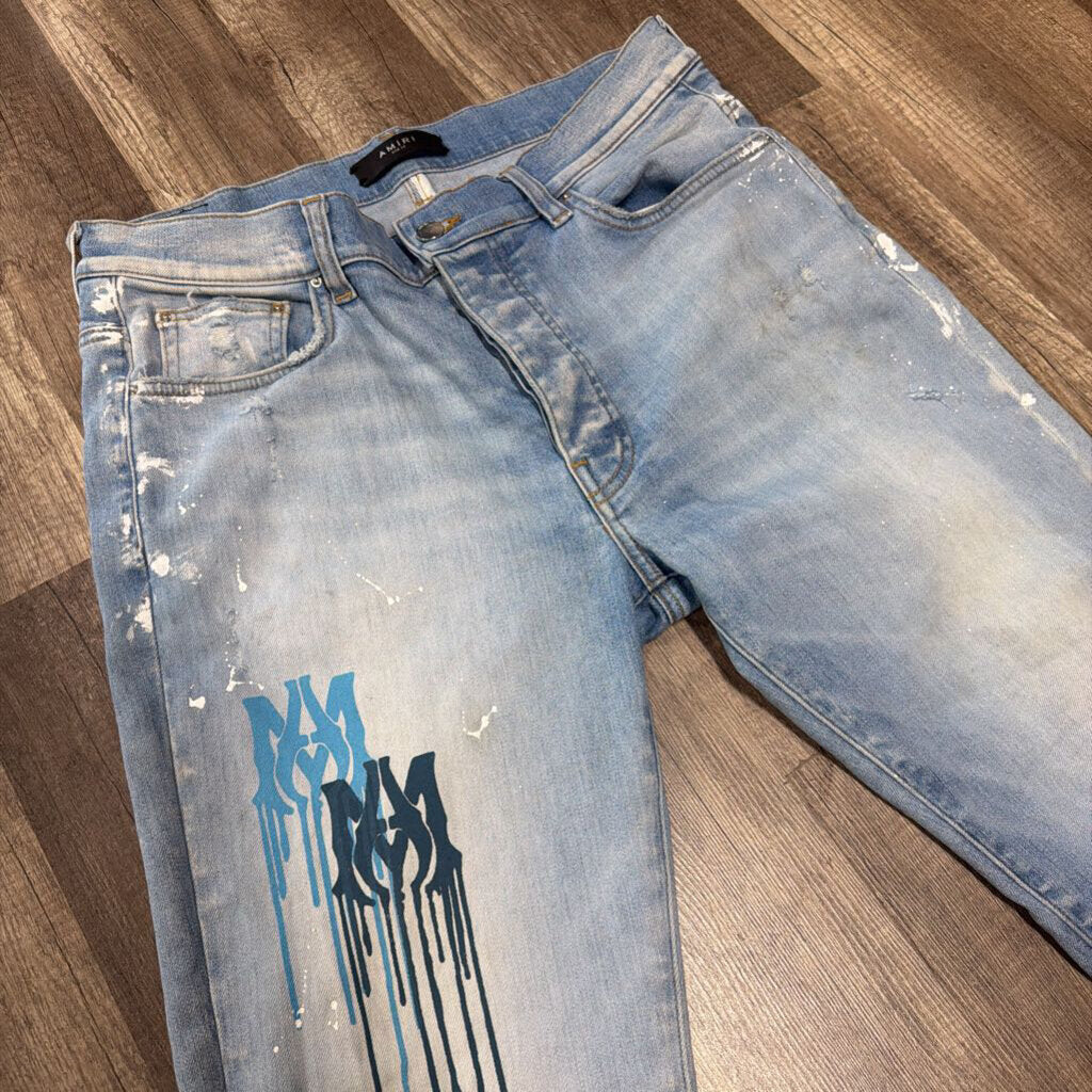 Amiri jean MA Logo Blue Paint splatter