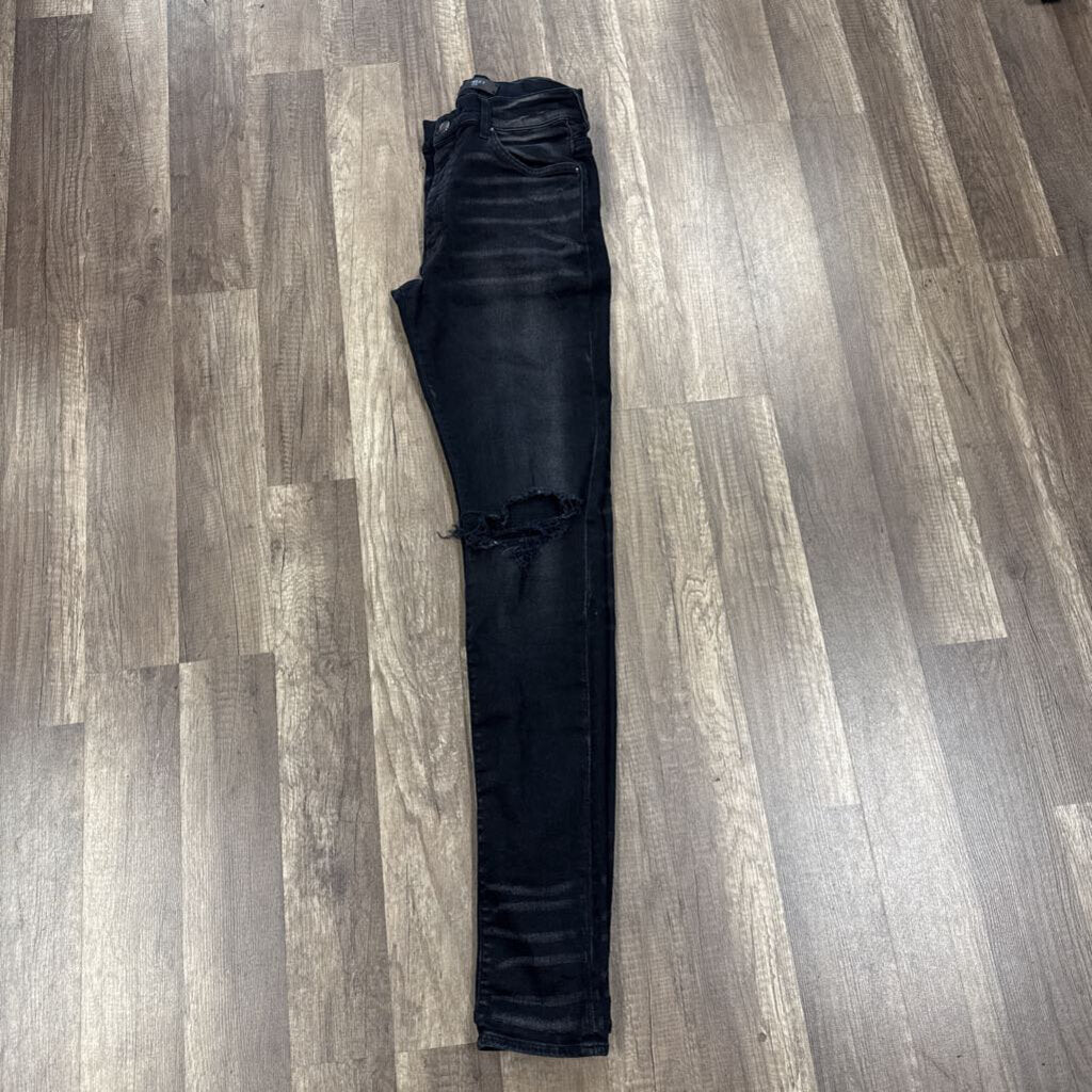 Amiri Jean Drip Logo