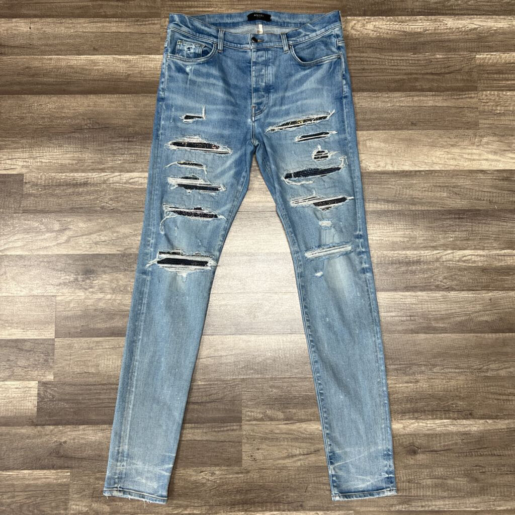Amiri jean blue multicolor thrasher patch