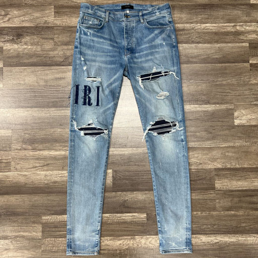 Amiri jean mx 1 blue patch oblique logo