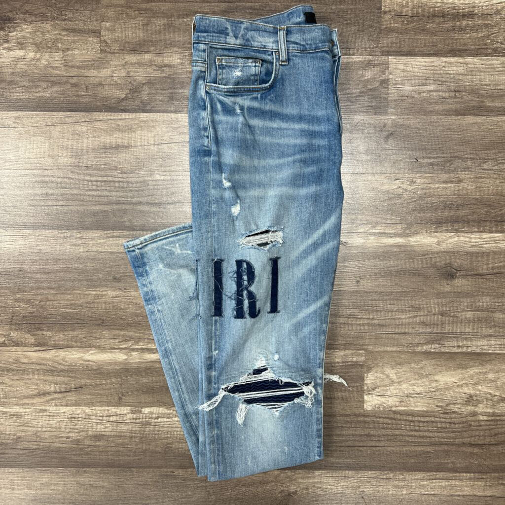 Amiri jean mx 1 blue patch oblique logo