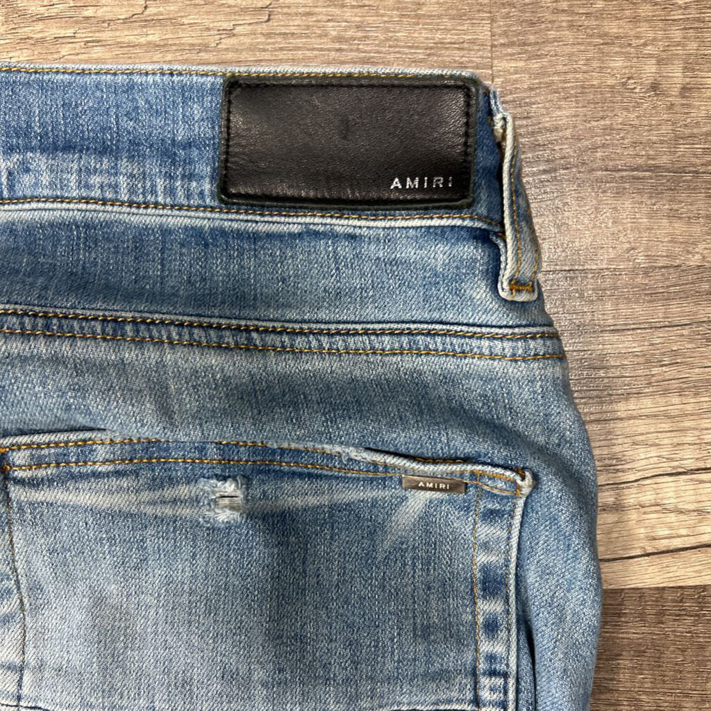 Amiri jean mx 1 blue patch oblique logo