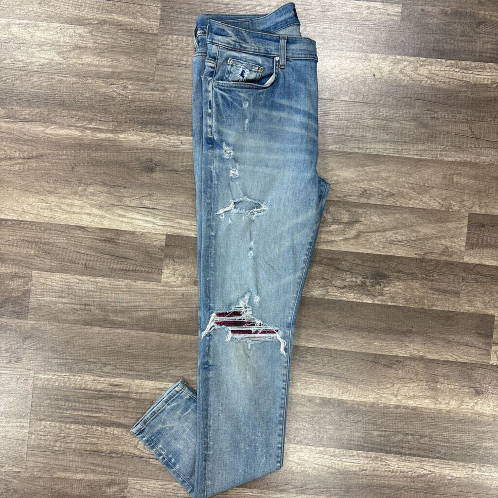 Amiri jean mx1 blue wash pink black patch