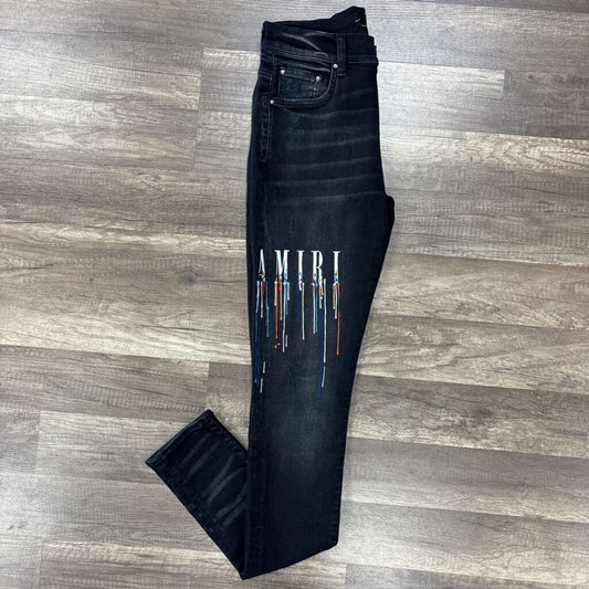 Amiri jean black paint drip