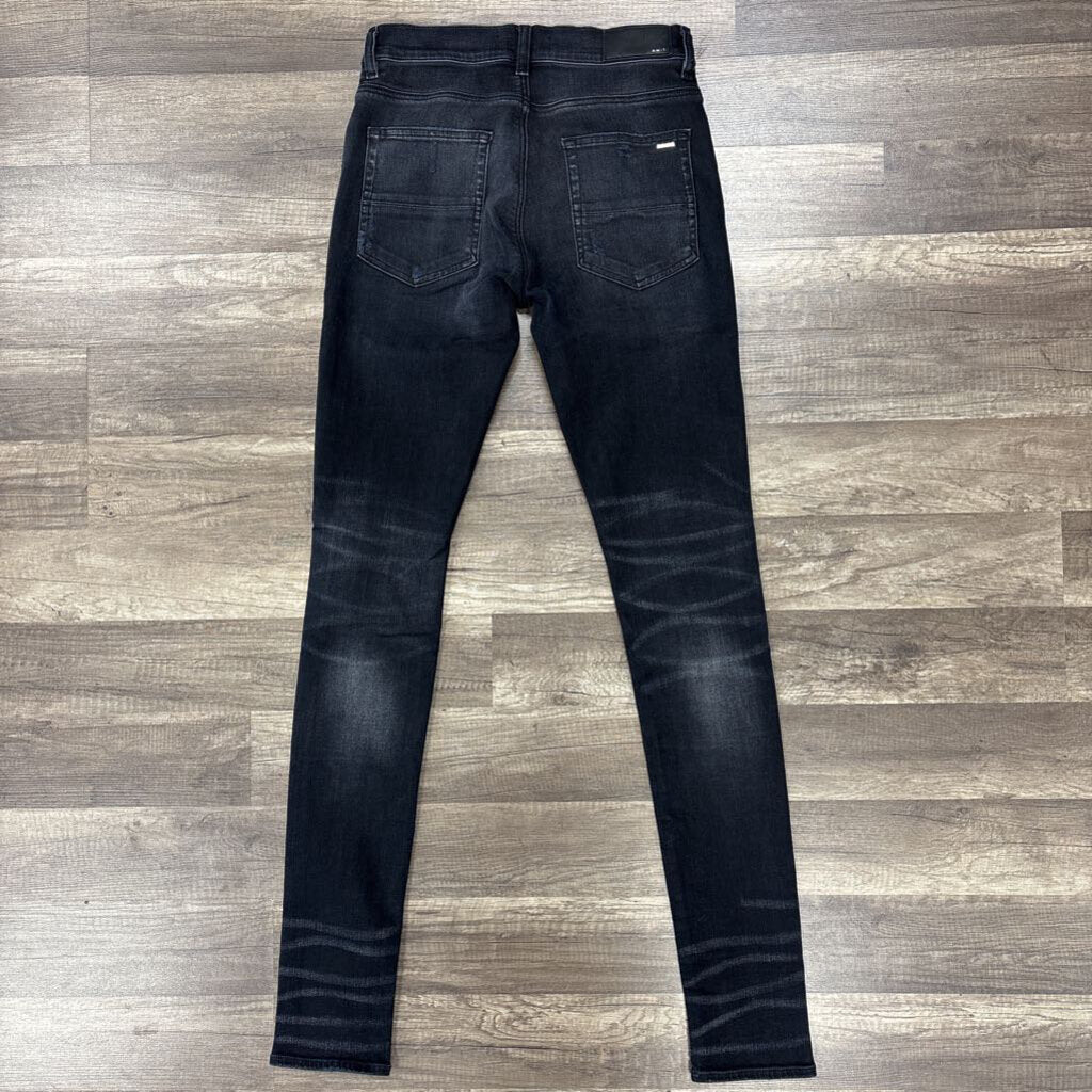 Amiri jean black paint drip