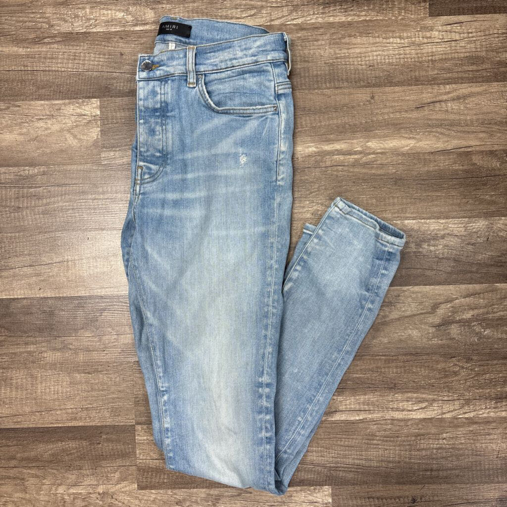 Amiri Jean white oblique logo