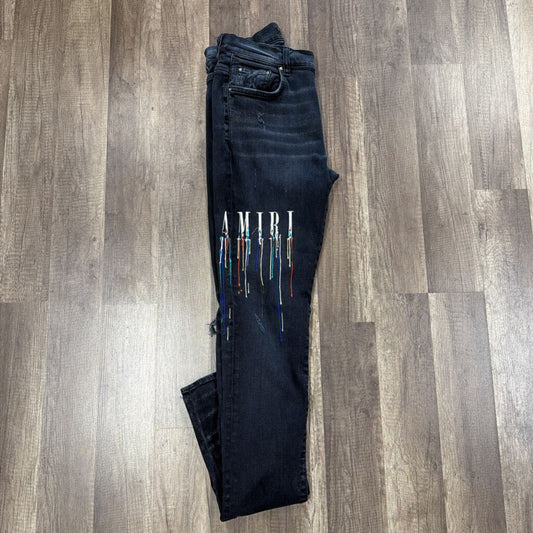 AmirI Jean Drip Logo