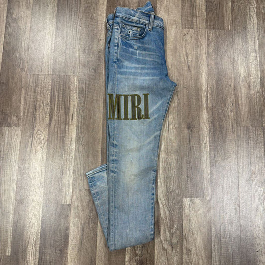 Amiri Camo Oblique Logo
