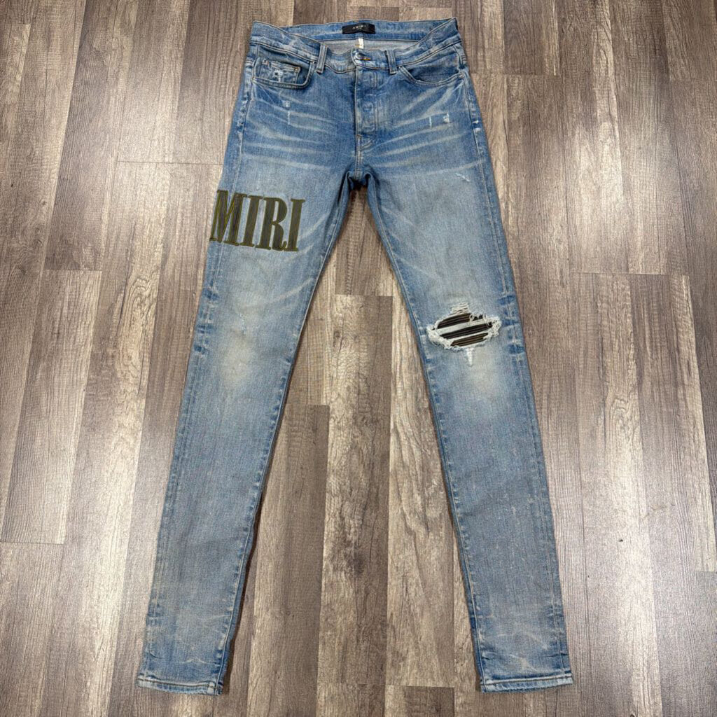 Amiri Camo Oblique Logo