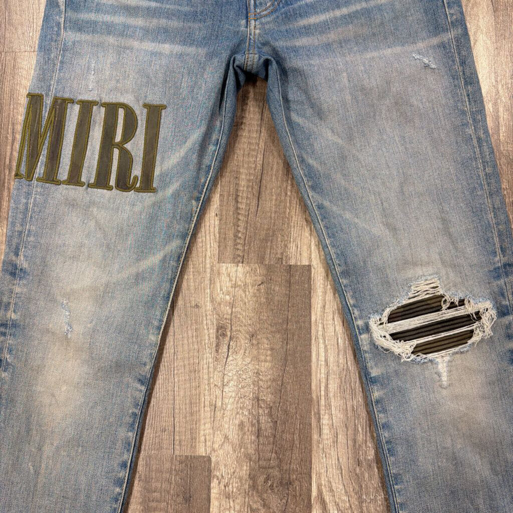 Amiri Camo Oblique Logo