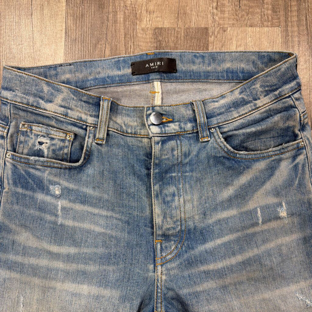 Amiri Camo Oblique Logo
