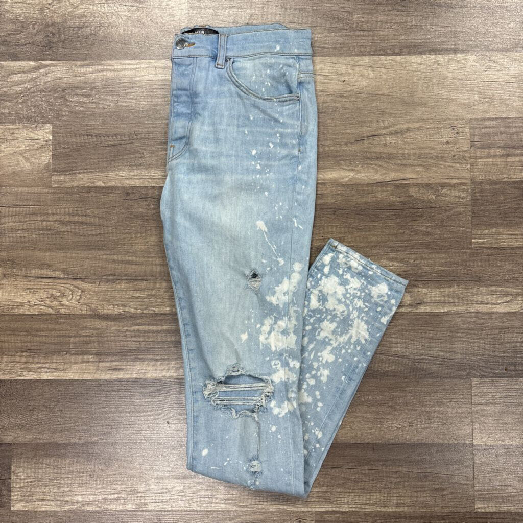 Amiri jean Ripped Knee Light blue