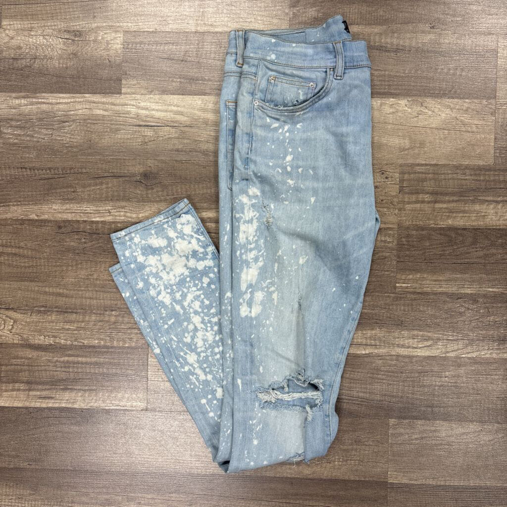 Amiri jean Ripped Knee Light blue