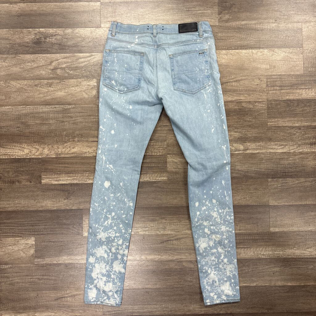 Amiri jean Ripped Knee Light blue