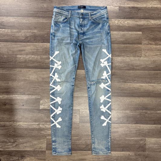 Amiri Jean White Crossbone Blue