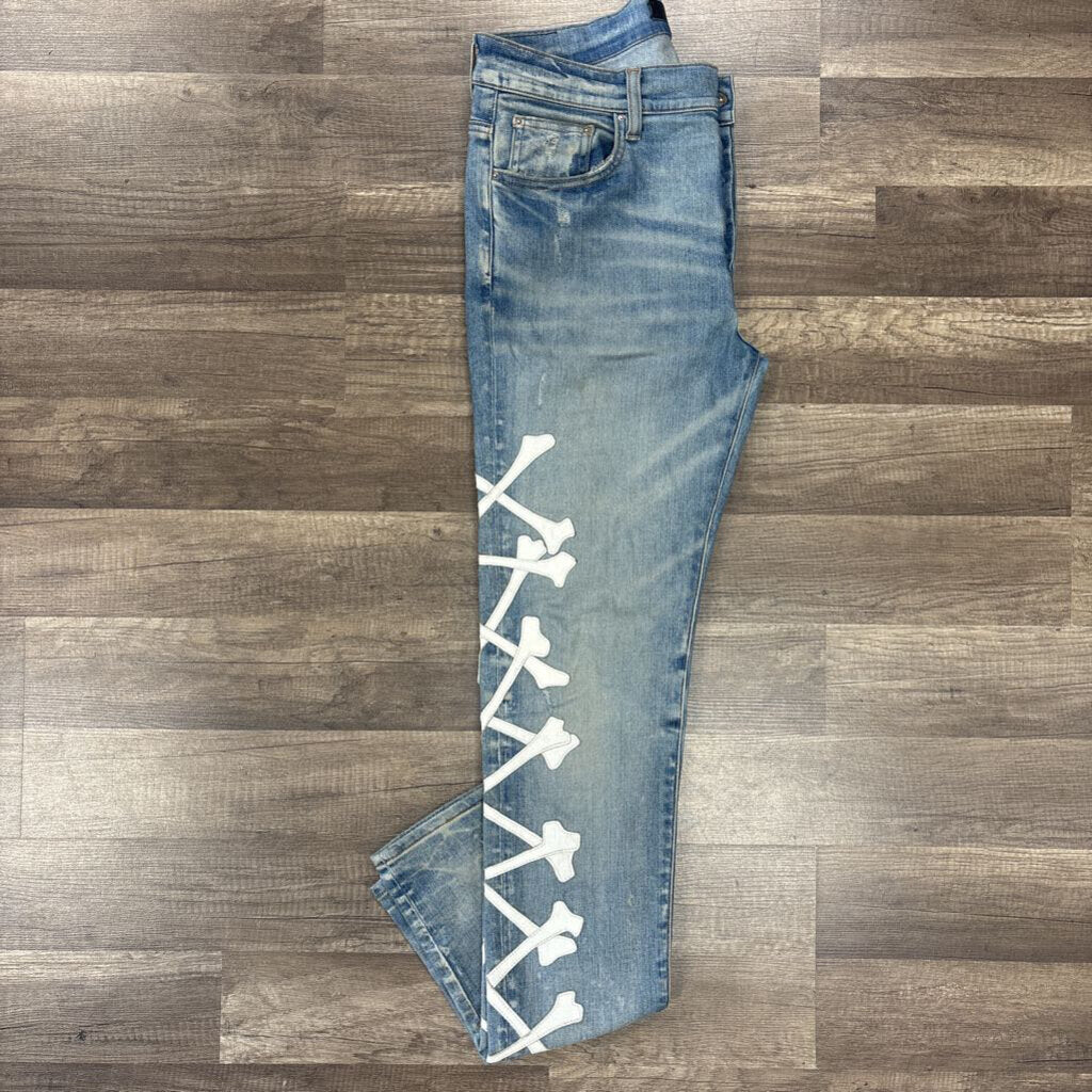 Amiri Jean White Crossbone Blue