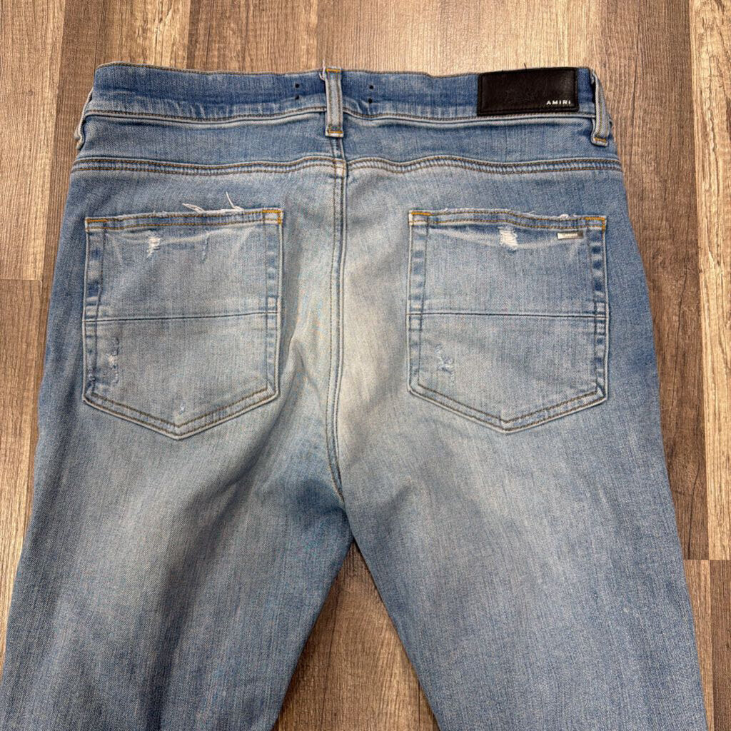 Amiri Jean Ripped Knee