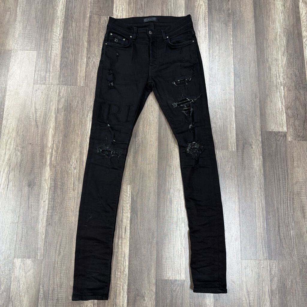 Amiri Jean Black Oblique Logo